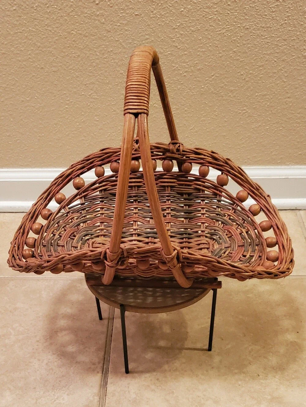 VTG. Handwoven Rattan Gathering Basket with Wood Bead Trim & Arched Handle.